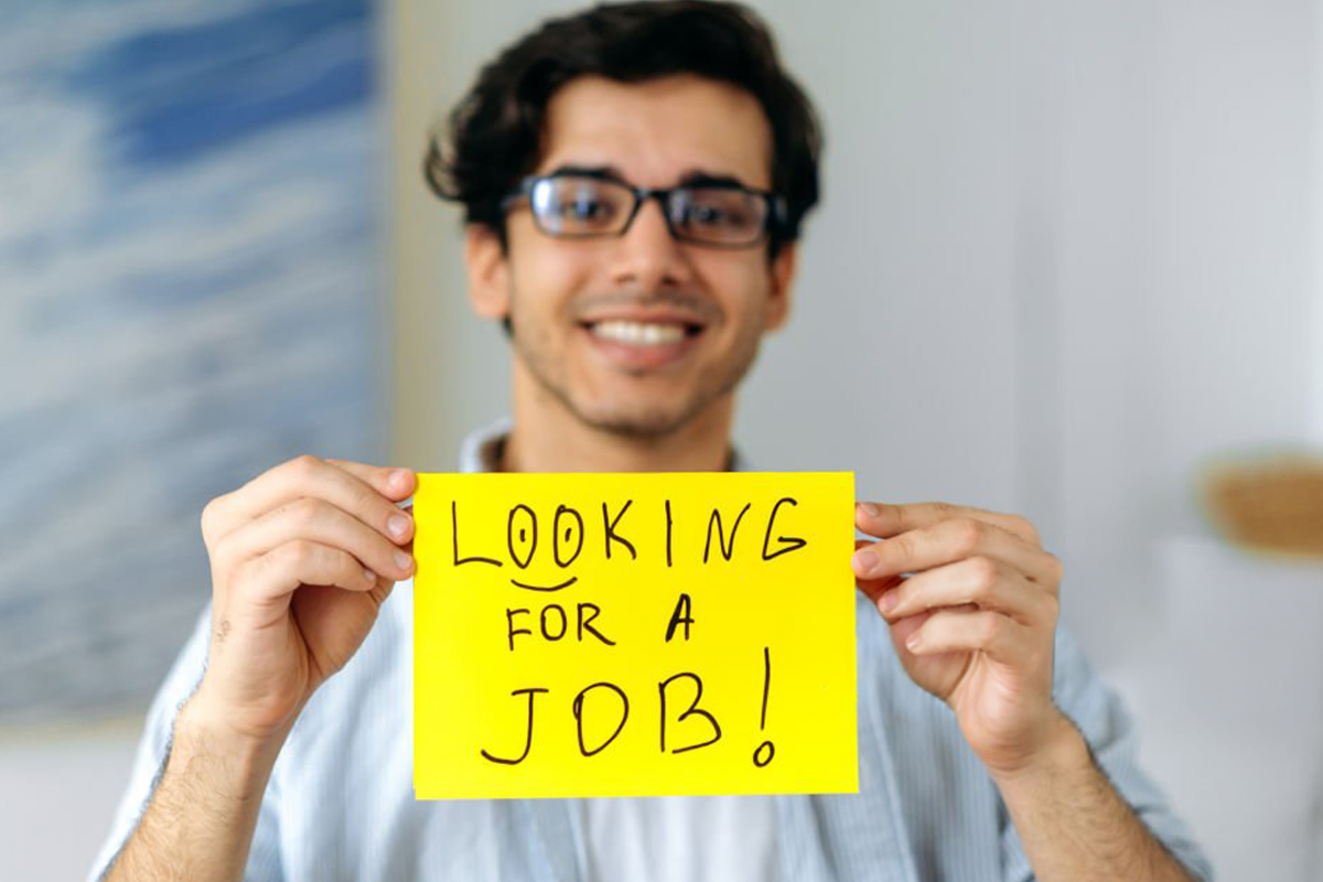 Happy job seeker working from home.